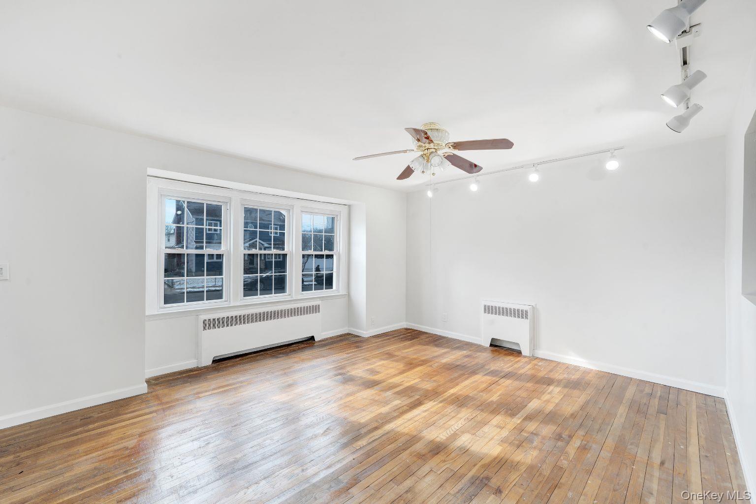 450 Rhodes Lane West Hempstead, NY 11552 - Photo 11 of 16 Additional view of he main living space showcasing size and layout.