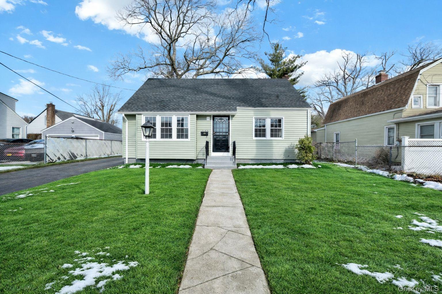 450 Rhodes Lane West Hempstead, NY 11552 - Photo 2 of 16 Walkway approach to front entrance with front yard