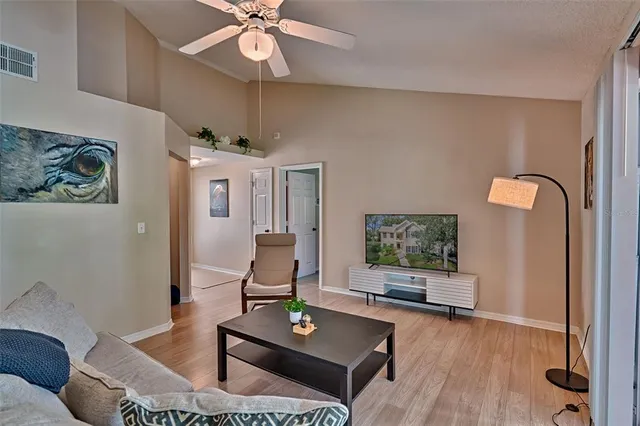 a living room with furniture and a window