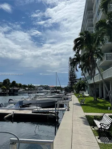 a view of residential houses with outdoor space