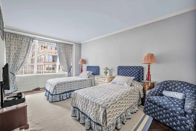 a bathroom with a shower and a mirror
