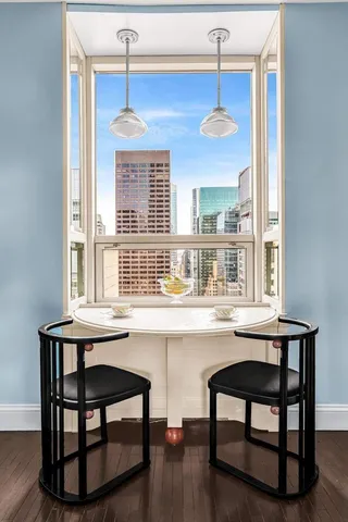 a kitchen with stainless steel appliances granite countertop a stove top oven a sink and dishwasher