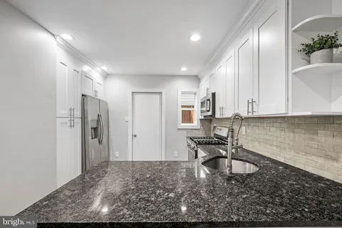 a view of outdoor space with chairs