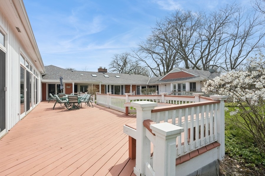 48 Meadowview Road Northfield, IL 60093 - Photo 17 of 42 a view of a house with pool and chairs