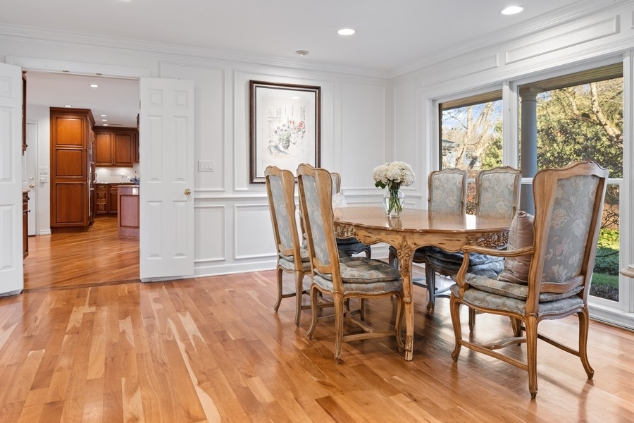 48 Meadowview Road Northfield, IL 60093 - Photo 24 of 42 a dining room with furniture window wooden floor