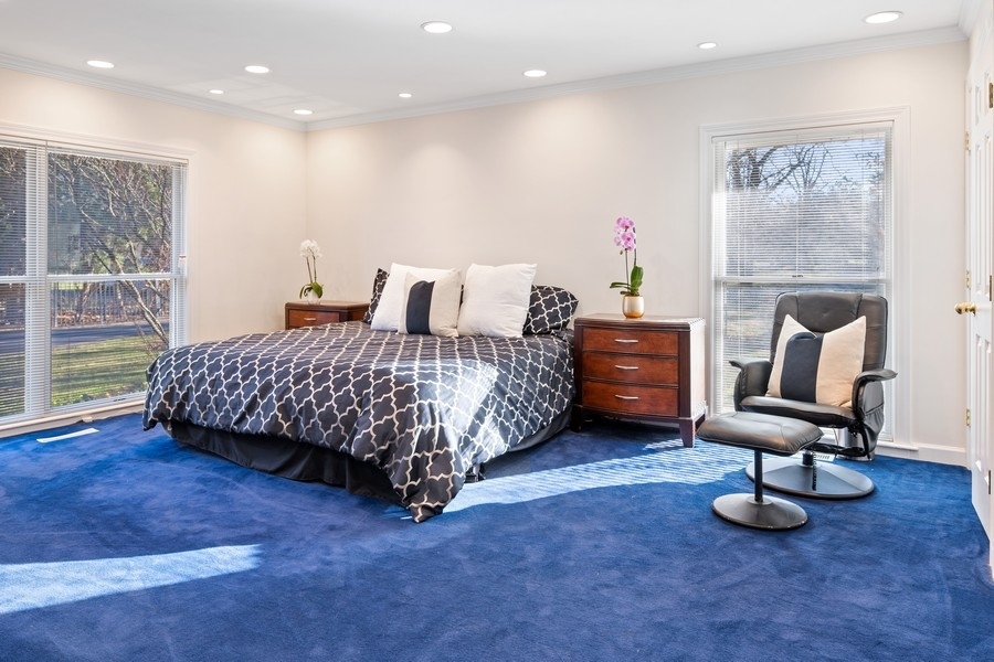 48 Meadowview Road Northfield, IL 60093 - Photo 29 of 42 a bedroom with a bed and a window