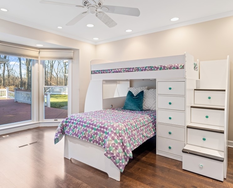 48 Meadowview Road Northfield, IL 60093 - Photo 30 of 42 a bedroom with a bed and a window