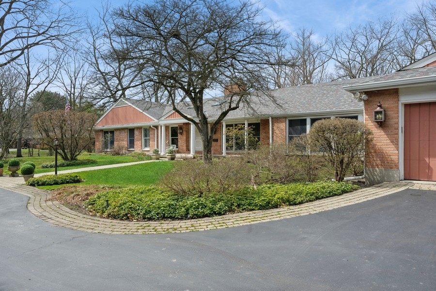 48 Meadowview Road Northfield, IL 60093 - Photo 32 of 42 a front view of a house with garden