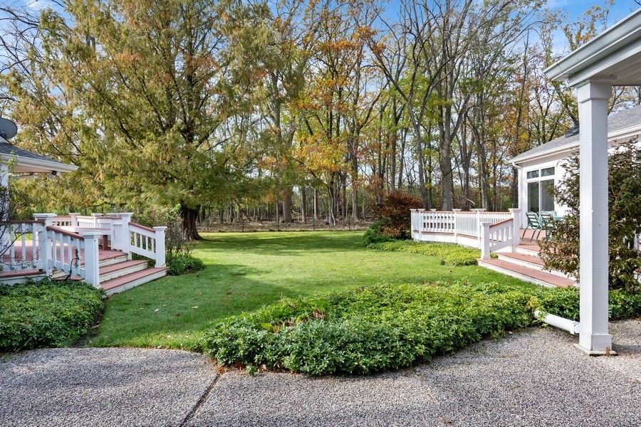 48 Meadowview Road Northfield, IL 60093 - Photo 35 of 42 a view of a garden with a bench