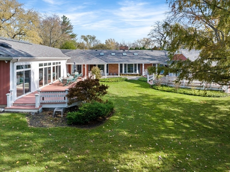 48 Meadowview Road Northfield, IL 60093 - Photo 37 of 42 a front view of a house with a garden