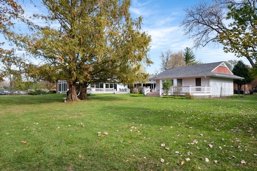 48 Meadowview Road Northfield, IL 60093 - Photo 39 of 42 a front view of a house with a garden
