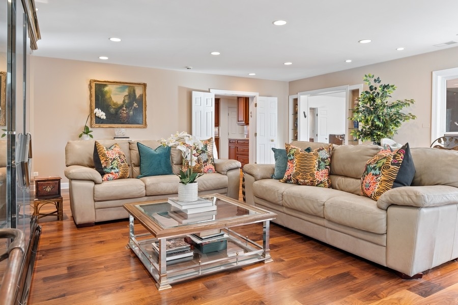 48 Meadowview Road Northfield, IL 60093 - Photo 10 of 42 a living room with furniture potted plant and a window