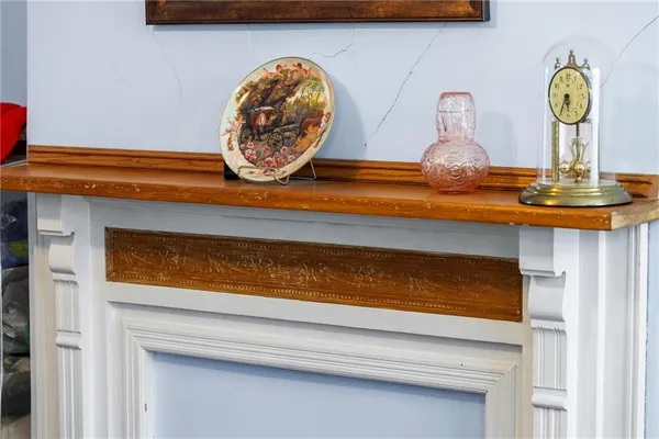 a bedroom with bed and a window