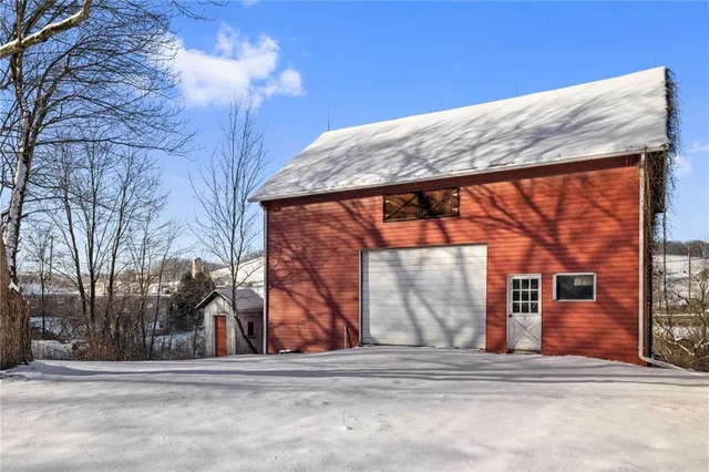 a view of a house with a roof deck