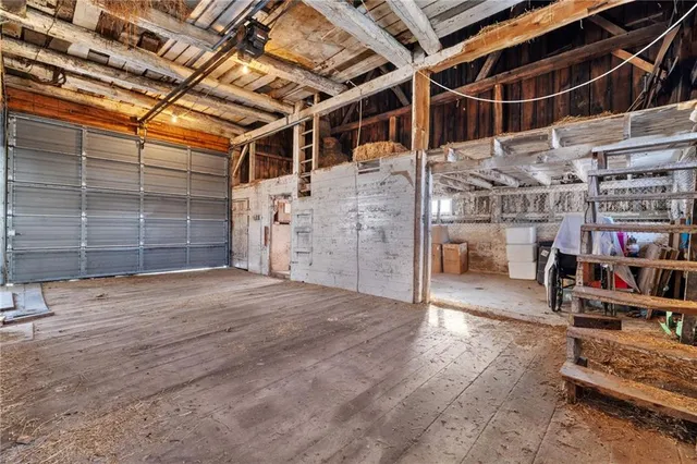 a view of a empty room with wooden walls
