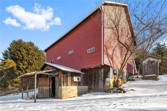 a front view of a building with parking space