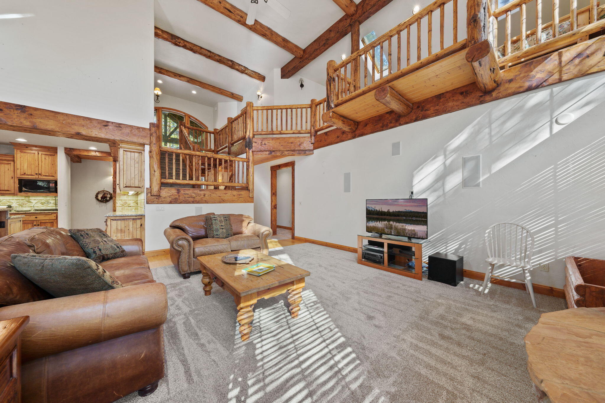 58026 Kinglet Road Sunriver, OR 97707 - Photo 9 of 39 a living room with furniture