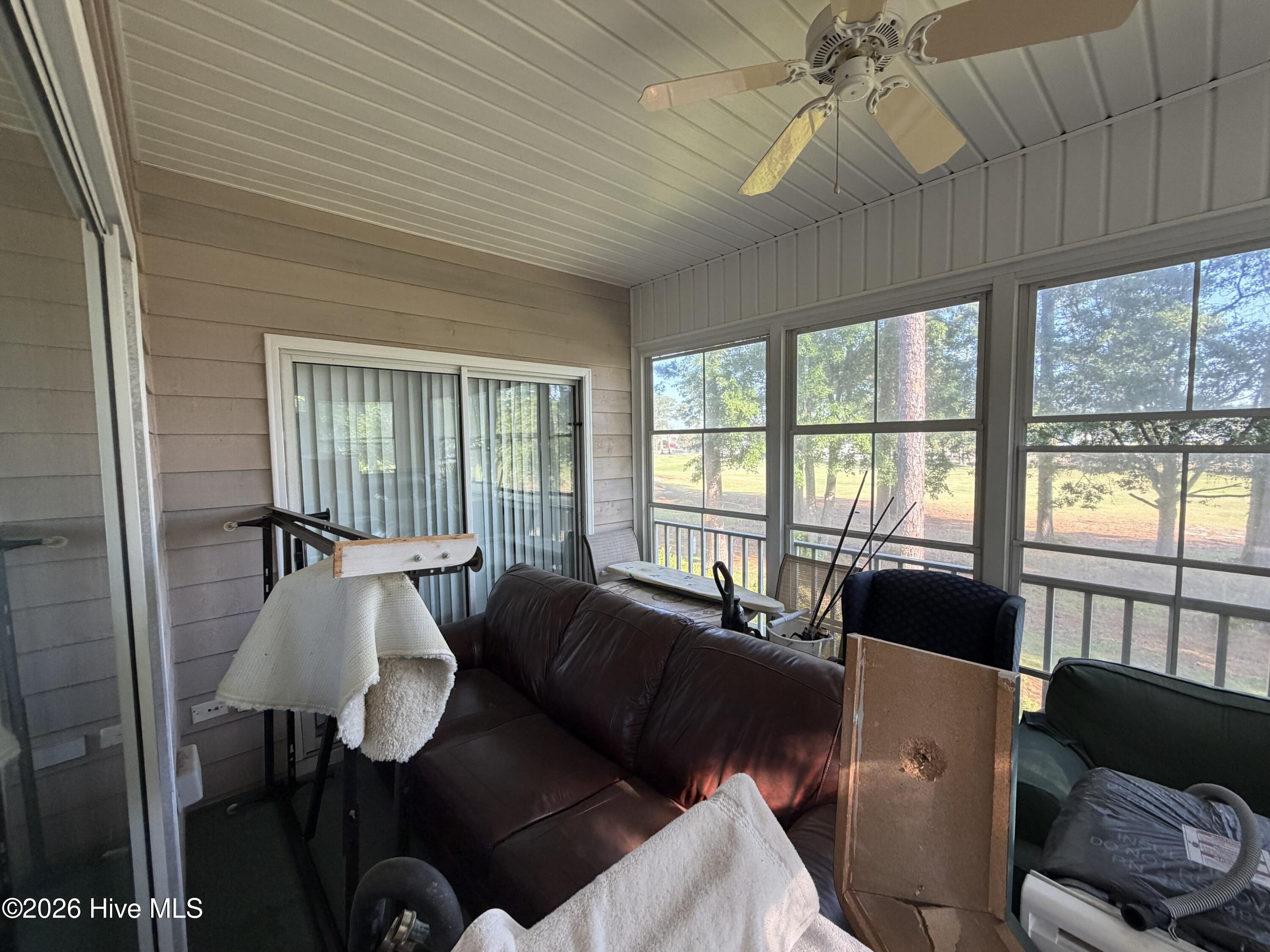 116 Rice Mill Circle, Unit 4 Sunset Beach, NC 28468 - Photo 22 of 29 Screened porch.