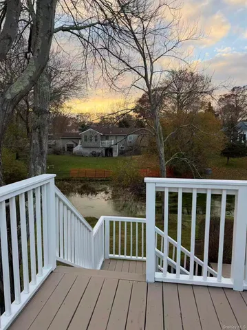 a view of a yard with an outdoor space