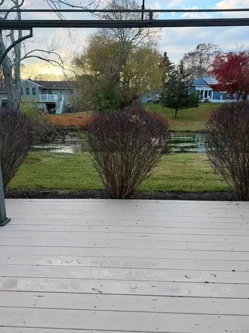 a view of swimming pool with trees