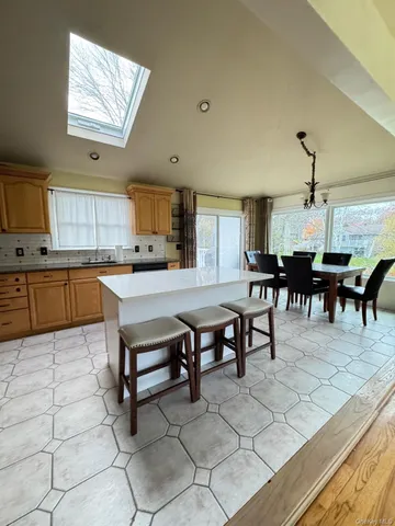 a view of kitchen with dining area