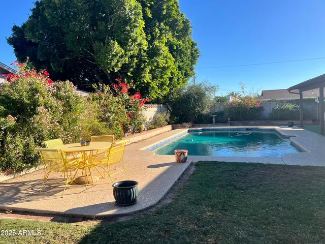 a view of a yard with an outdoor space