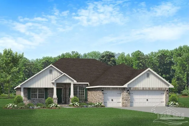 a view of a yard in front of a house with plants and large tree