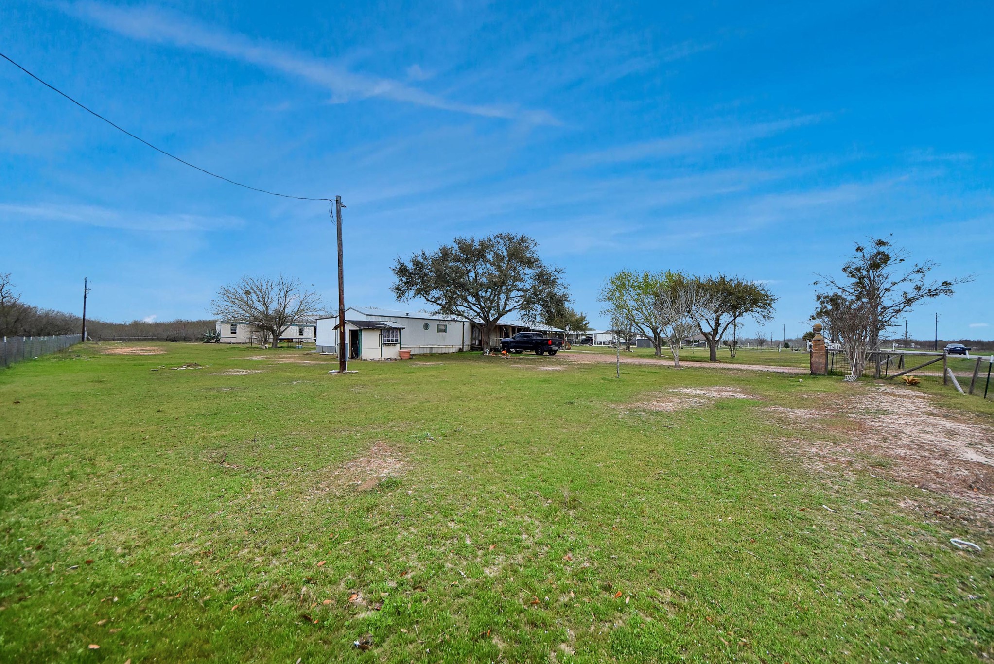 10571 Kerr Road Hempstead, TX 77445 - Photo 3 of 20 a view of yard with grass & street