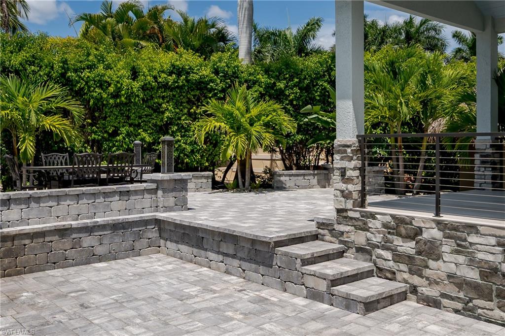 13613 Snapper Lane Naples, FL 34114 - Photo 19 of 49 a view of outdoor space with seating area