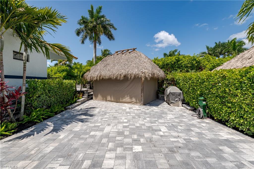 13613 Snapper Lane Naples, FL 34114 - Photo 25 of 49 a pathway of a house