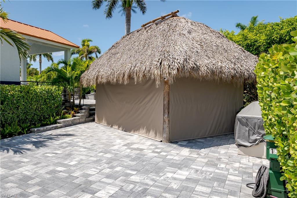 13613 Snapper Lane Naples, FL 34114 - Photo 27 of 49 a backyard of a house