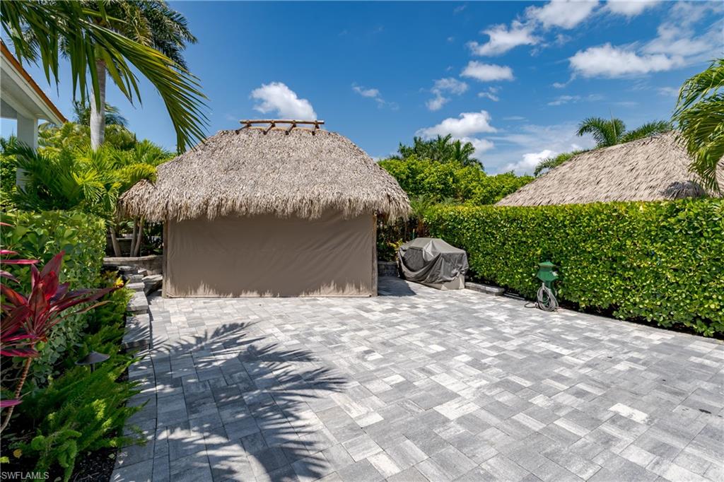 13613 Snapper Lane Naples, FL 34114 - Photo 28 of 49 a view of a backyard of the house