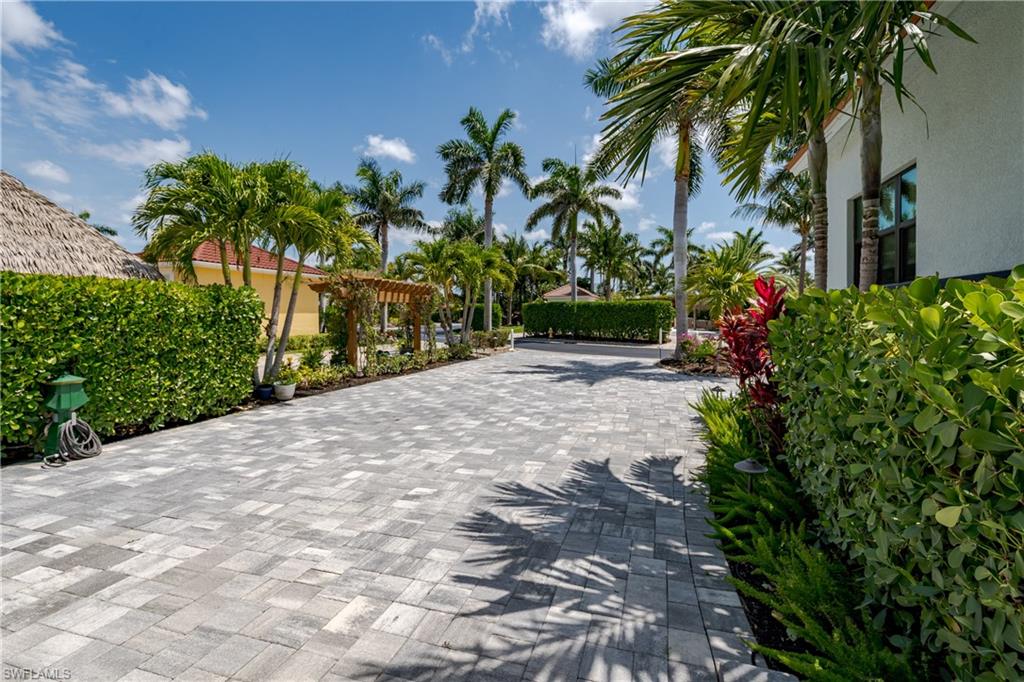 13613 Snapper Lane Naples, FL 34114 - Photo 29 of 49 a view of a backyard of a house