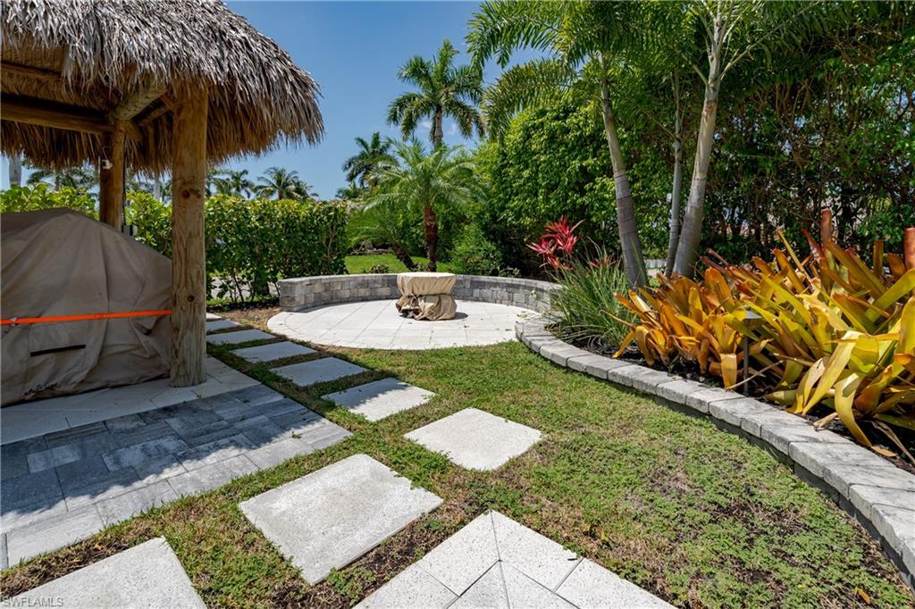 13613 Snapper Lane Naples, FL 34114 - Photo 33 of 49 a view of an outdoor space
