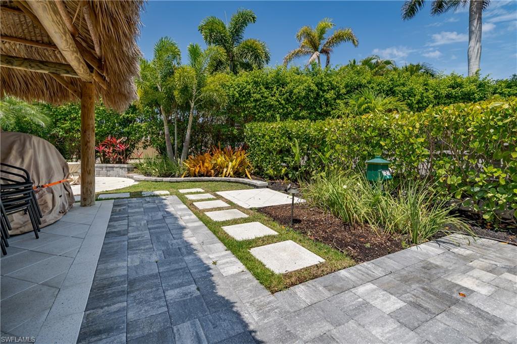 13613 Snapper Lane Naples, FL 34114 - Photo 36 of 49 a view of a backyard