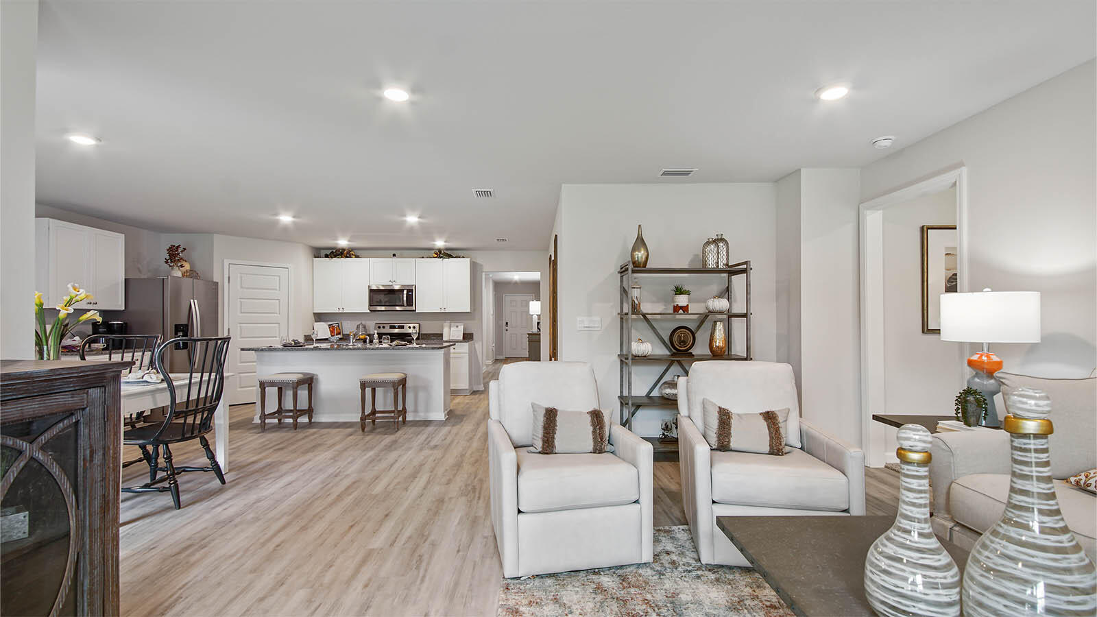 31 Riverwalk Circle Freeport, FL 32439 - Photo 13 of 38 a living room with furniture and a wooden floor
