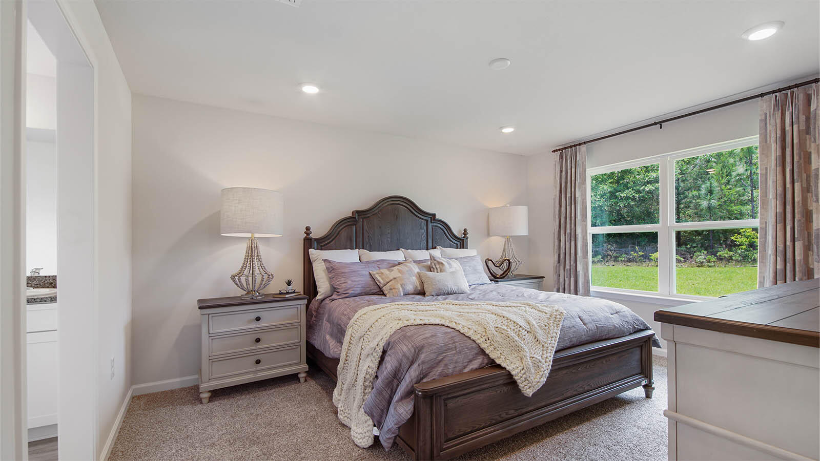 31 Riverwalk Circle Freeport, FL 32439 - Photo 15 of 38 a bedroom with a bed and a large window