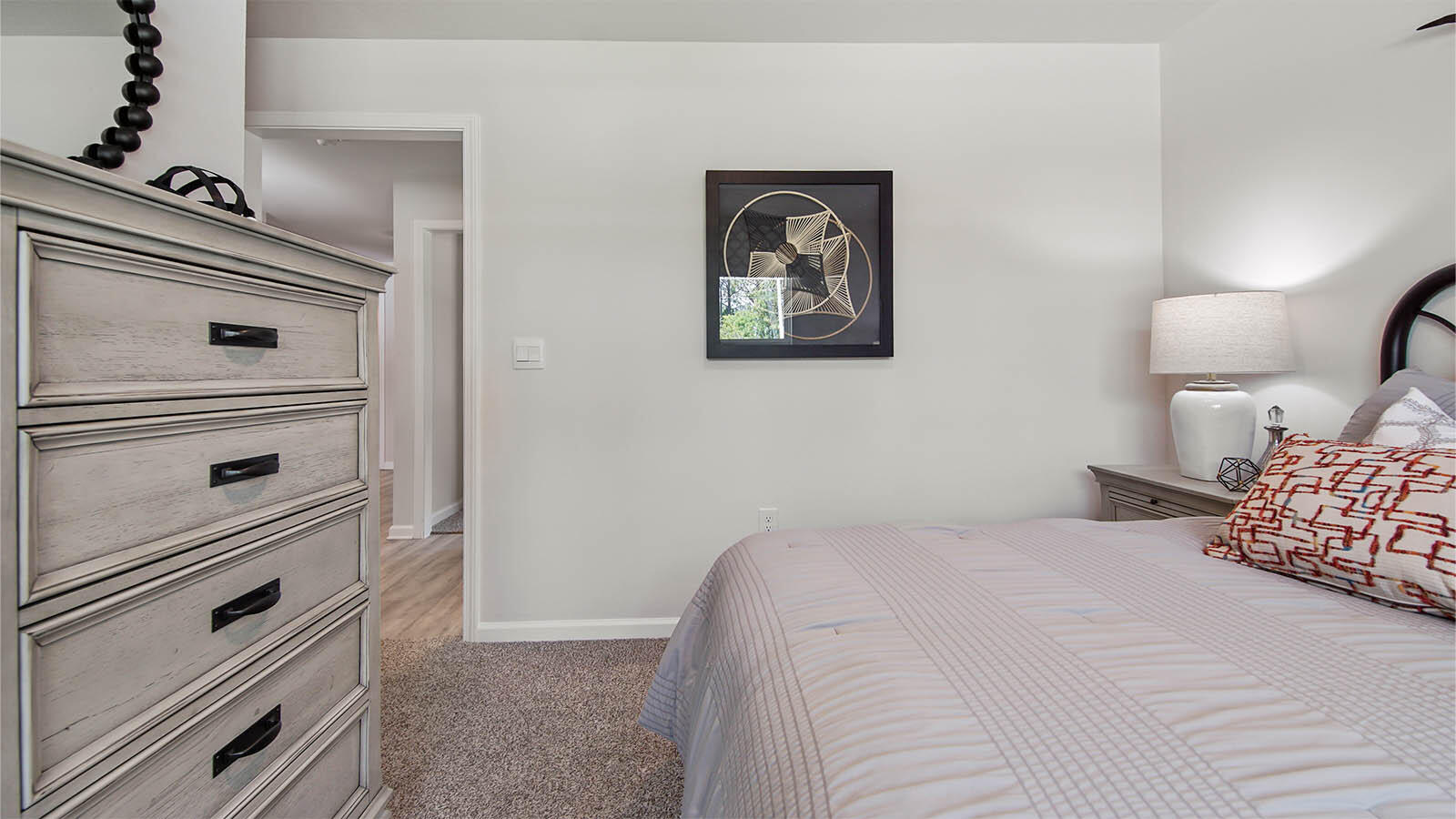 31 Riverwalk Circle Freeport, FL 32439 - Photo 26 of 38 a bedroom with a bed and a dresser