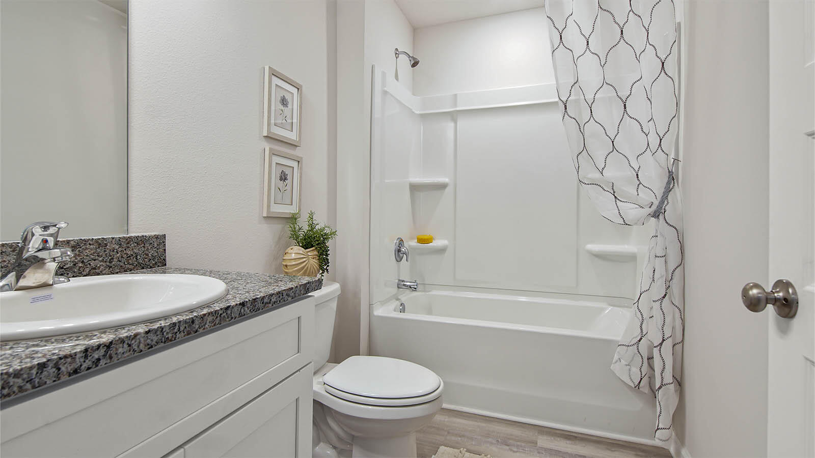31 Riverwalk Circle Freeport, FL 32439 - Photo 27 of 38 a bathroom with a granite countertop sink toilet and shower