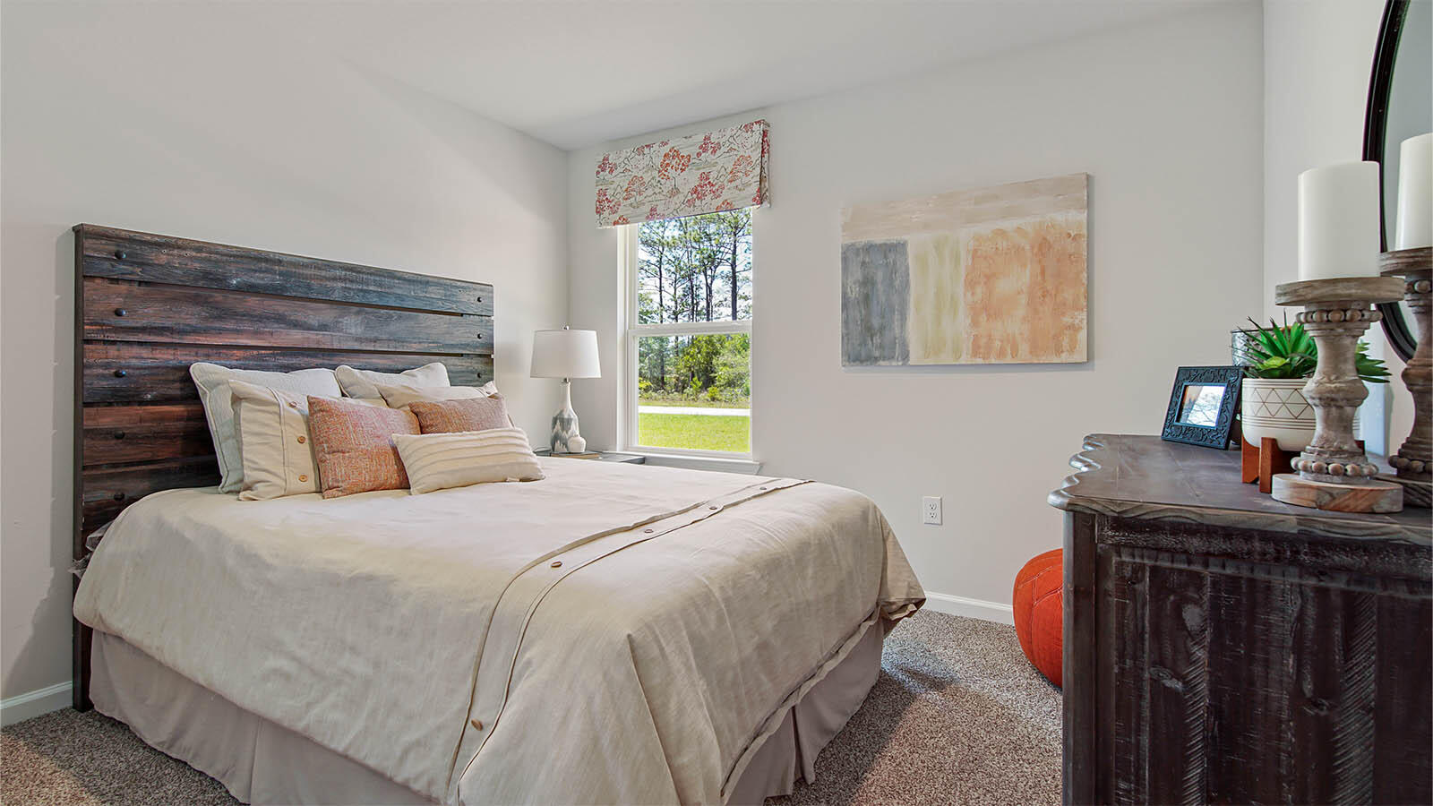 31 Riverwalk Circle Freeport, FL 32439 - Photo 28 of 38 a bedroom with a bed and a dresser next to a window