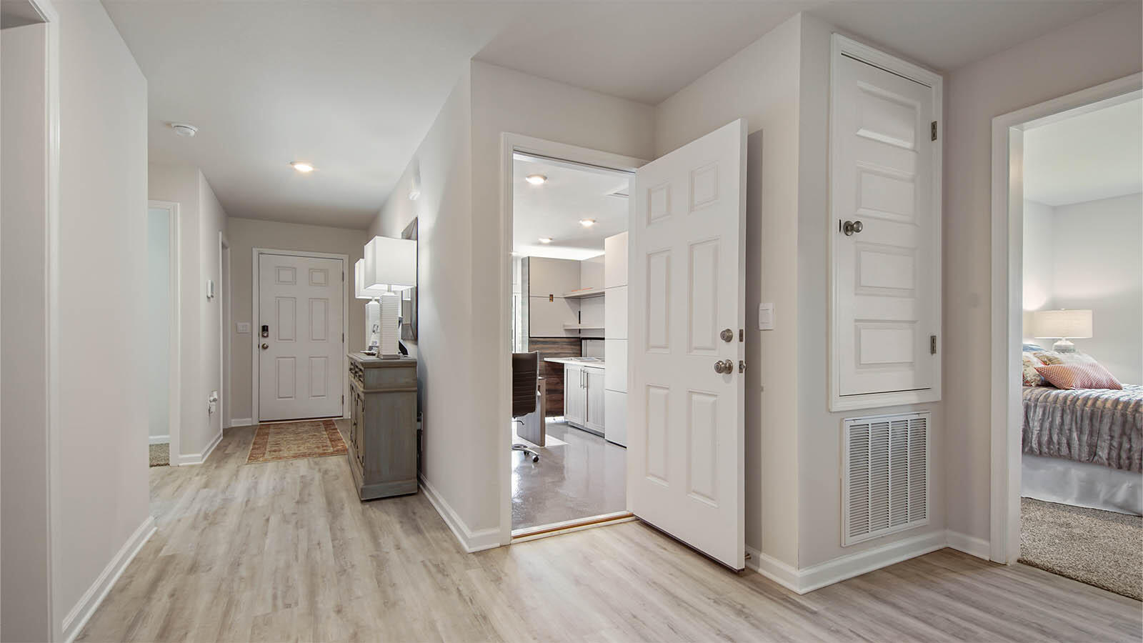 31 Riverwalk Circle Freeport, FL 32439 - Photo 32 of 38 a view of a hallway with wooden floor and a bathroom