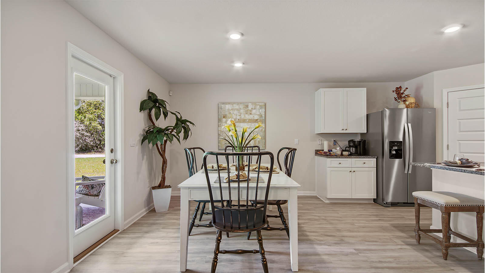 31 Riverwalk Circle Freeport, FL 32439 - Photo 9 of 38 a view of a dining room with furniture window and wooden floor