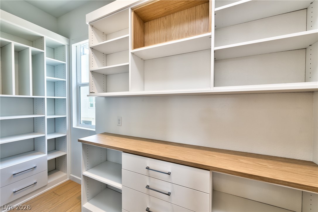 3327 Esker Rdg Avenue Henderson, NV 89044 - Photo 7 of 24 Ample shelving and drawers provide an organized storage haven.