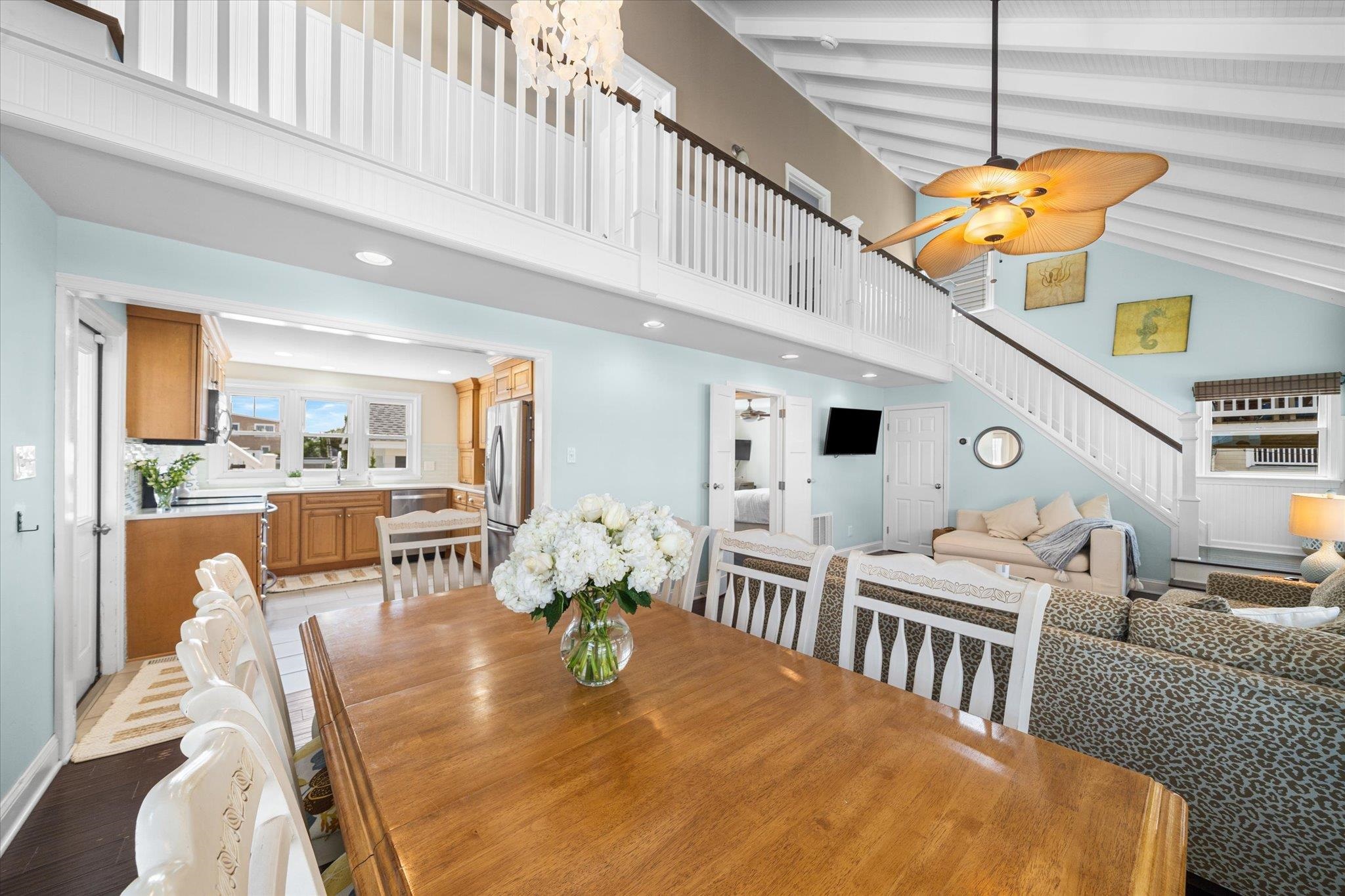 8610 3rd Stone Harbor, NJ 08247 - Photo 15 of 46 a dining room filled with furniture and wooden floor