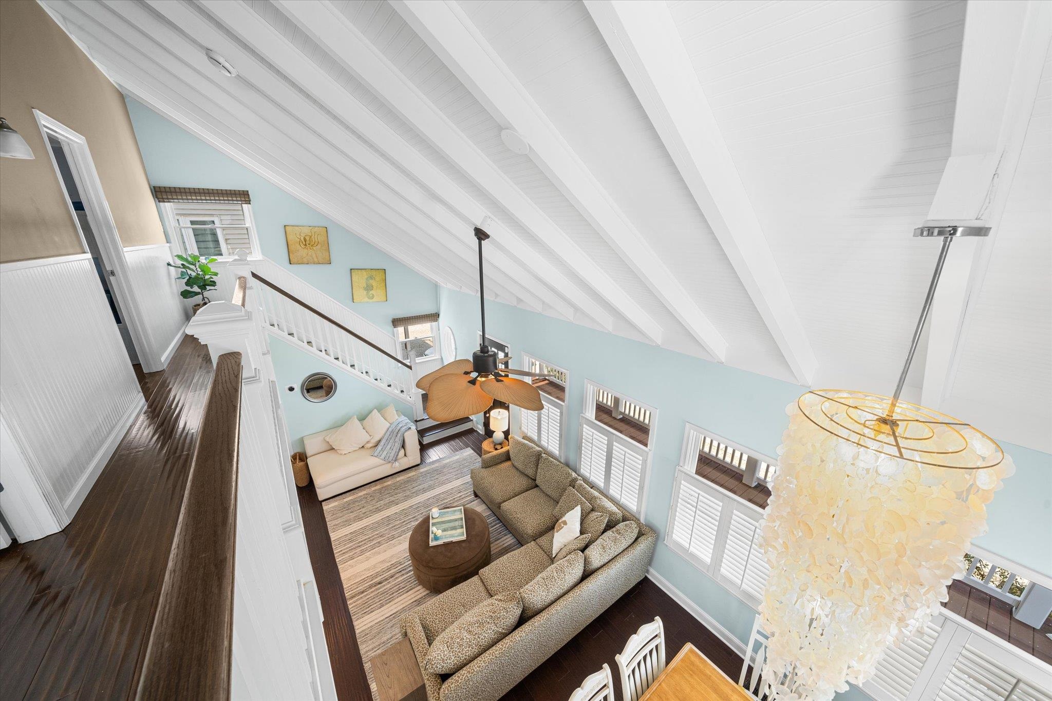 8610 3rd Stone Harbor, NJ 08247 - Photo 39 of 46 a living room with chairs and a wooden floor