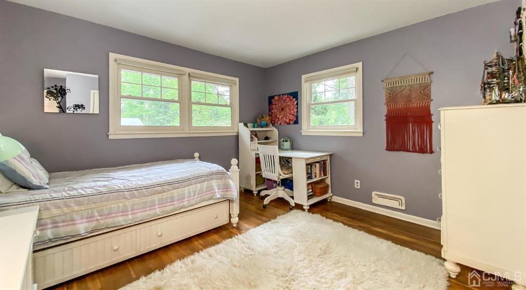 32 Huntington Road Edison, NJ 08820 - Photo 19 of 34 a bed room with a bed and a window