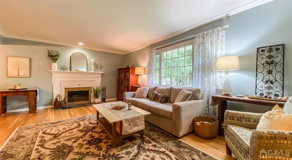 32 Huntington Road Edison, NJ 08820 - Photo 4 of 34 a living room with furniture fireplace and window