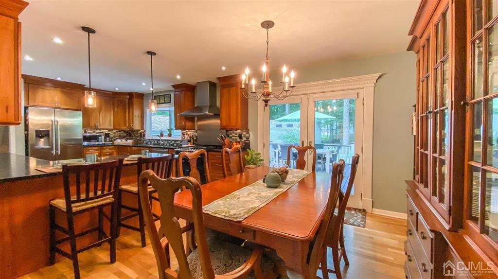 32 Huntington Road Edison, NJ 08820 - Photo 10 of 34 a view of a dining room with furniture window and outside view