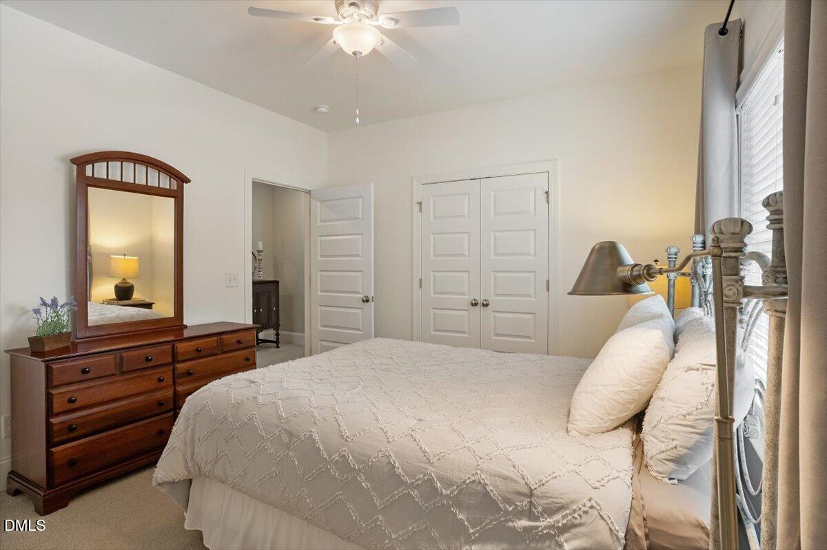 1404 Ivy Lane Raleigh, NC 27609 - Photo 23 of 37 Recessed lighting, ceiling fan, and white paneled doors