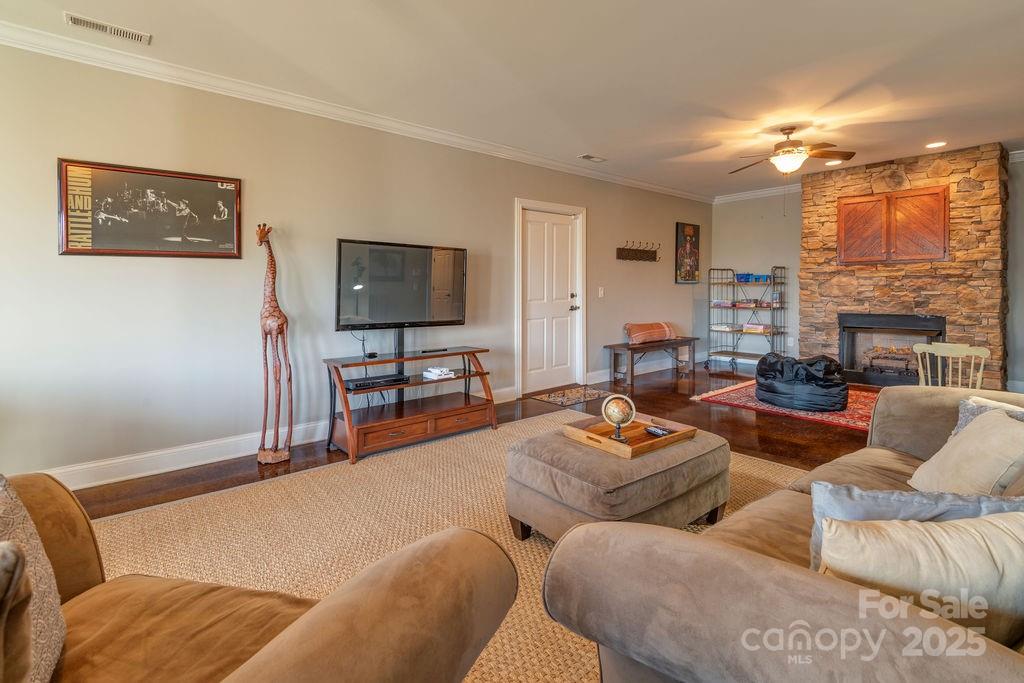 61 Buckle Ridge Weaverville, NC 28787 - Photo 28 of 42 a living room with furniture and a flat screen tv